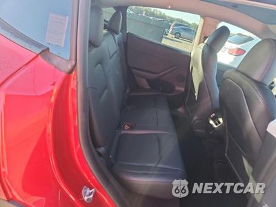 Zdjęcie 10 z 12 samochodu: 2023 TESLA MODEL Y VIN:7SAYGDEE2PF864203 - miniatura