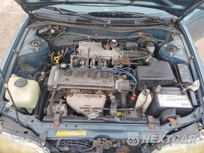 Zdjęcie 11 z 12 samochodu: 1996 TOYOTA COROLLA DX VIN:2T1BB02E2TC175677 - miniatura