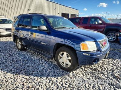 Czwarte zdjęcie samochodu z boku: 2002 GMC ENVOY VIN:1GKDT13S922118426 - miniatura