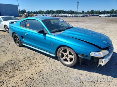 Czwarte zdjęcie samochodu z boku: 1994 FORD MUSTANG GT VIN:1FALP42T7RF127416 - miniatura