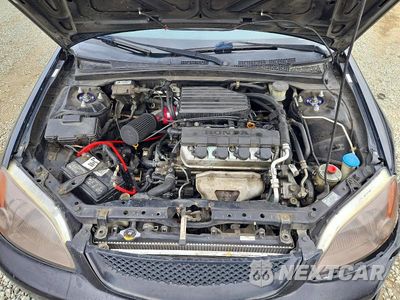Zdjęcie 11 z 13 samochodu: 2002 HONDA CIVIC LX VIN:1HGEM22542L087306 - miniatura