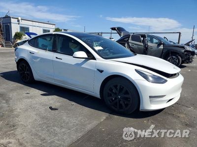 Czwarte zdjęcie samochodu z boku: 2021 TESLA MODEL 3 VIN:5YJ3E1EA8MF873752 - miniatura