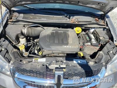 Zdjęcie 12 z 13 samochodu: 2018 DODGE GRAND CARAVAN SXT VIN:2C4RDGCG9JR328229 - miniatura