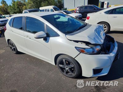 Czwarte zdjęcie samochodu z boku: 2016 HONDA FIT LX VIN:JHMGK5H58GX024312 - miniatura