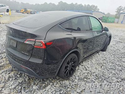 Trzecie zdjęcie samochodu z tyłu: 2022 TESLA MODEL Y VIN:7SAYGDEE7NF387457 - miniatura