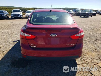 Zdjęcie 6 z 12 samochodu: 2014 FORD FOCUS TITANIUM VIN:1FADP3J29EL234289 - miniatura