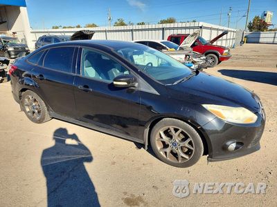 Czwarte zdjęcie samochodu z boku: 2013 FORD FOCUS SE VIN:1FADP3F25DL287109 - miniatura