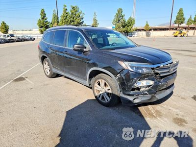 Czwarte zdjęcie samochodu z boku: 2018 HONDA PILOT LX VIN:5FNYF5H17JB022091 - miniatura