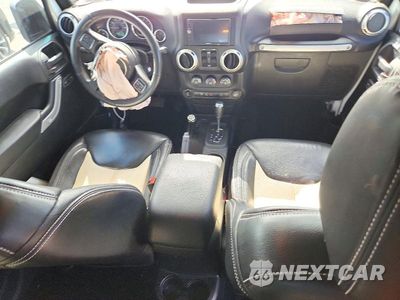 Zdjęcie 8 z 13 samochodu: 2017 JEEP WRANGLER UNLIMITED SAHARA VIN:1C4HJWEG3HL624863 - miniatura