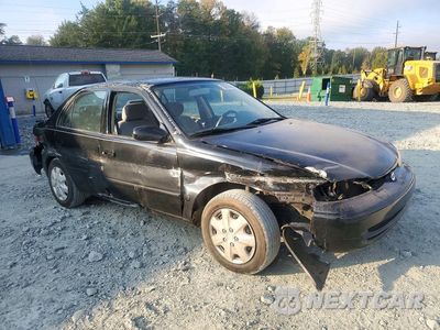 Czwarte zdjęcie samochodu z boku: 1999 CHEVROLET GEO PRIZM BASE VIN:1Y1SK5285XZ406778 - miniatura