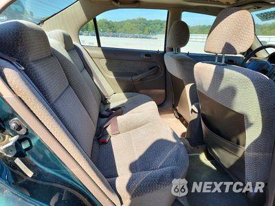 Zdjęcie 10 z 12 samochodu: 1999 HONDA CIVIC EX VIN:2HGEJ8647XH540545 - miniatura