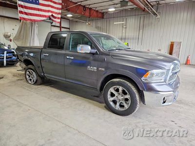 Czwarte zdjęcie samochodu z boku: 2017 RAM 1500 LARAMIE VIN:1C6RR7NT9HS774747 - miniatura