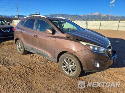 Czwarte zdjęcie samochodu z boku: 2015 HYUNDAI TUCSON SE VIN:KM8JUCAG9FU024638 - miniatura
