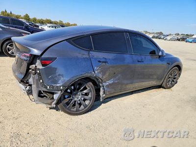 Trzecie zdjęcie samochodu z tyłu: 2023 TESLA MODEL Y VIN:7SAYGAEE6PF632458 - miniatura