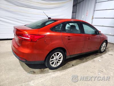 Trzecie zdjęcie samochodu z tyłu: 2018 FORD FOCUS SE VIN:1FADP3F23JL298105 - miniatura