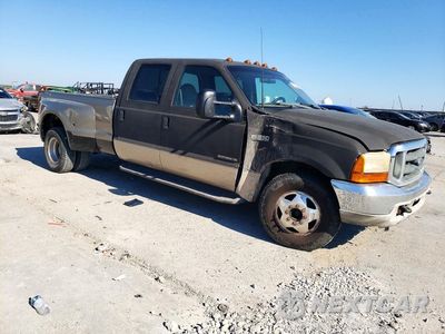Czwarte zdjęcie samochodu z boku: 1999 FORD F350 SUPER DUTY VIN:1FTWW32F0XEE37943 - miniatura