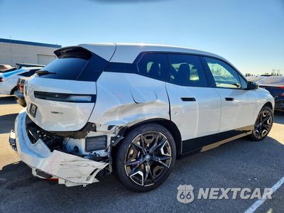 Trzecie zdjęcie samochodu z tyłu: 2024 BMW IX XDRIVE50 VIN:WB523CF07RCR51375 - miniatura