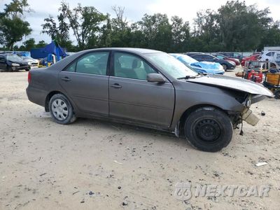 Czwarte zdjęcie samochodu z boku: 2003 TOYOTA CAMRY LE VIN:4T1BE32K33U767215 - miniatura