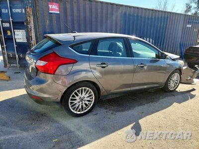 Trzecie zdjęcie samochodu z tyłu: 2012 FORD FOCUS SEL VIN:1FAHP3M27CL282903 - miniatura
