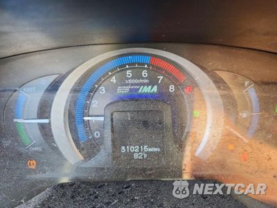 Zdjęcie 9 z 12 samochodu: 2010 HONDA INSIGHT EX VIN:JHMZE2H76AS018254 - miniatura