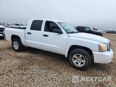 Czwarte zdjęcie samochodu z boku: 2007 DODGE DAKOTA QUAD SLT VIN:1D7HE48K97S120823 - miniatura