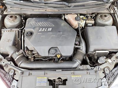 Zdjęcie 11 z 12 samochodu: 2009 PONTIAC G6 VIN:1G2ZG57NX94181491 - miniatura