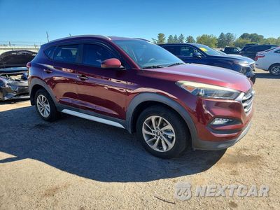 Czwarte zdjęcie samochodu z boku: 2017 HYUNDAI TUCSON SE VIN:KM8J33A49HU414313 - miniatura