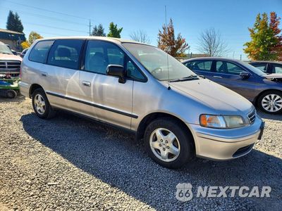 Czwarte zdjęcie samochodu z boku: 1998 HONDA ODYSSEY LX VIN:JHMRA3848WC012142 - miniatura