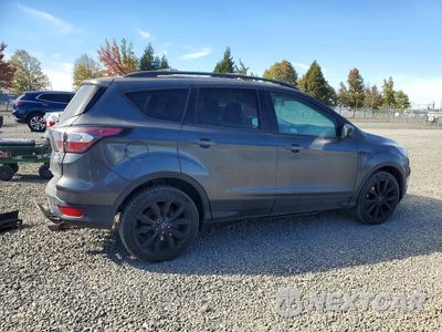 Trzecie zdjęcie samochodu z tyłu: 2017 FORD ESCAPE SE VIN:1FMCU9G95HUA15331 - miniatura