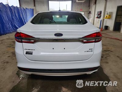 Zdjęcie 6 z 12 samochodu: 2018 FORD FUSION SE HYBRID VIN:3FA6P0LU9JR141404 - miniatura