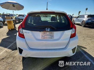 Zdjęcie 6 z 12 samochodu: 2016 HONDA FIT LX VIN:JHMGK5H51GX011420 - miniatura
