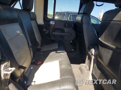 Zdjęcie 10 z 12 samochodu: 2009 JEEP WRANGLER UNLIMITED SAHARA VIN:1J4GA591X9L732081 - miniatura