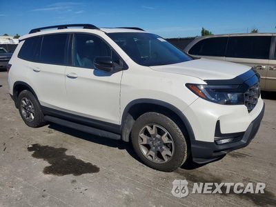Czwarte zdjęcie samochodu z boku: 2023 HONDA PASSPORT TRAIL SPORT VIN:5FNYF8H63PB006010 - miniatura