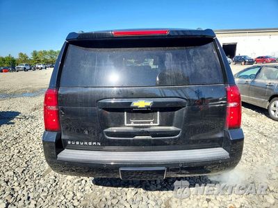 Zdjęcie 6 z 13 samochodu: 2018 CHEVROLET SUBURBAN VIN:1GNSKHKCXJR315238 - miniatura