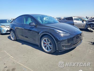 Czwarte zdjęcie samochodu z boku: 2023 TESLA MODEL Y VIN:7SAYGDEF1PF925419 - miniatura