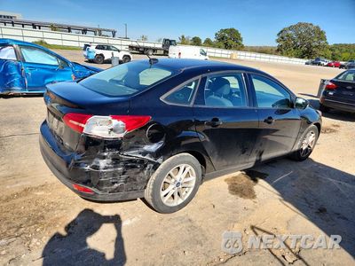 Trzecie zdjęcie samochodu z tyłu: 2017 FORD FOCUS SE VIN:1FADP3F29HL327830 - miniatura