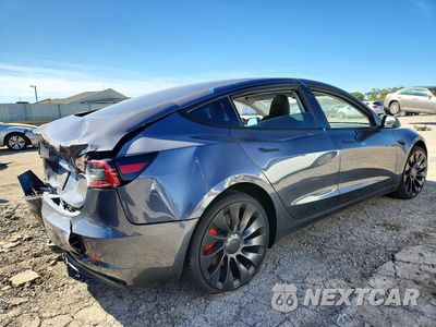 Trzecie zdjęcie samochodu z tyłu: 2023 TESLA MODEL 3 VIN:5YJ3E1EC6PF635730 - miniatura