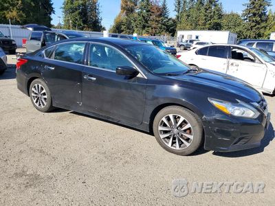 Czwarte zdjęcie samochodu z boku: 2017 NISSAN ALTIMA 2.5 SV VIN:1N4AL3AP0HC121085 - miniatura