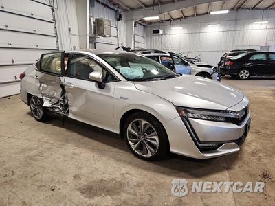 Czwarte zdjęcie samochodu z boku: 2021 HONDA CLARITY VIN:JHMZC5F16MC001667 - miniatura
