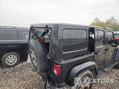 Zdjęcie 12 z 13 samochodu: 2017 JEEP WRANGLER UNLIMITED SAHARA VIN:1C4HJWEG5HL506832 - miniatura