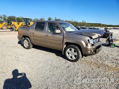Czwarte zdjęcie samochodu z boku: 2010 HONDA RIDGELINE RTL VIN:5FPYK1F53AB013969 - miniatura