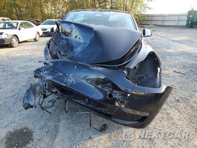 Piąte zdjęcie samochodu w środku: 2025 TESLA MODEL Y VIN:7SAYGAEE6SF227077 - miniatura