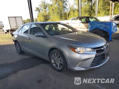 Czwarte zdjęcie samochodu z boku: 2015 TOYOTA CAMRY HYBRID XLE VIN:4T1BD1FK8FU150205 - miniatura