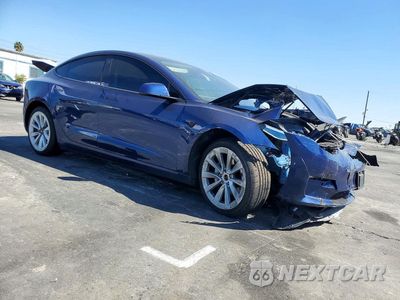 Czwarte zdjęcie samochodu z boku: 2022 TESLA MODEL 3 VIN:5YJ3E1EBXNF184693 - miniatura