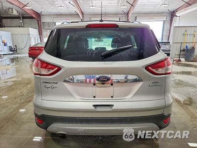 Zdjęcie 6 z 12 samochodu: 2013 FORD ESCAPE SEL VIN:1FMCU0H93DUD36787 - miniatura