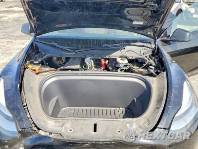 Zdjęcie 11 z 12 samochodu: 2023 TESLA MODEL Y VIN:7SAYGDEE8PA113880 - miniatura