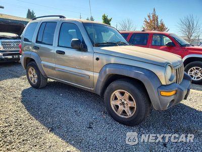 Czwarte zdjęcie samochodu z boku: 2003 JEEP LIBERTY SPORT VIN:1J4GL48K13W675368 - miniatura