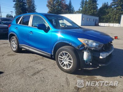 Czwarte zdjęcie samochodu z boku: 2014 MAZDA CX-5 TOURING VIN:JM3KE4CY7E0324211 - miniatura