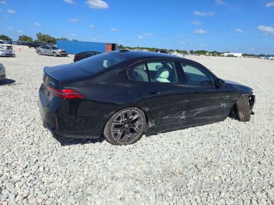 Trzecie zdjęcie samochodu z tyłu: 2026 BMW 550 XE VIN:WBA13FK09TCV70204 - miniatura