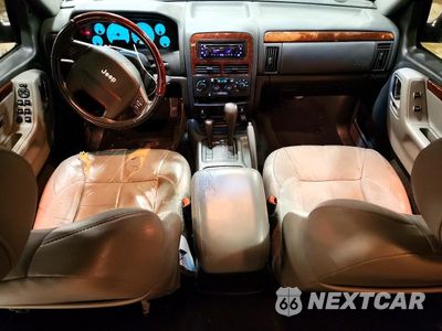 Zdjęcie 8 z 13 samochodu: 2003 JEEP GRAND CHEROKEE OVERLAND VIN:1J8GW68J53C573131 - miniatura
